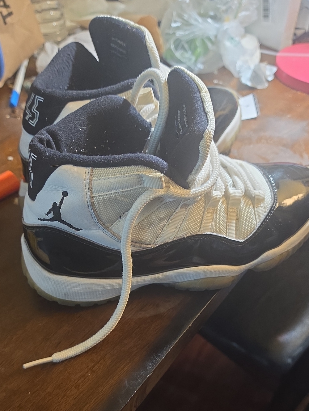 Jordan Retro 11 High-Top Sneakers in White and Black
